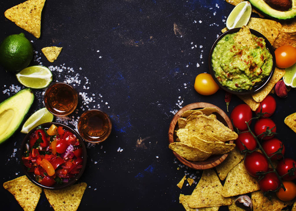 Tex-Mex Concept, Nachos, Guacamole, Salsa Sauce and Tequila, Food Background, Top View - Фото, изображение