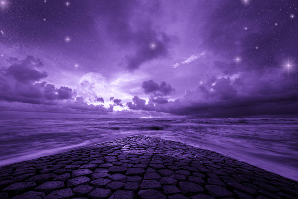 Ultra violet fantasy background, road to the ocean with fantastic night starry sky, color of the year 2018 - Photo, Image