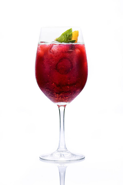 Fresh red cocktail in wine glass on white background - Foto, immagini