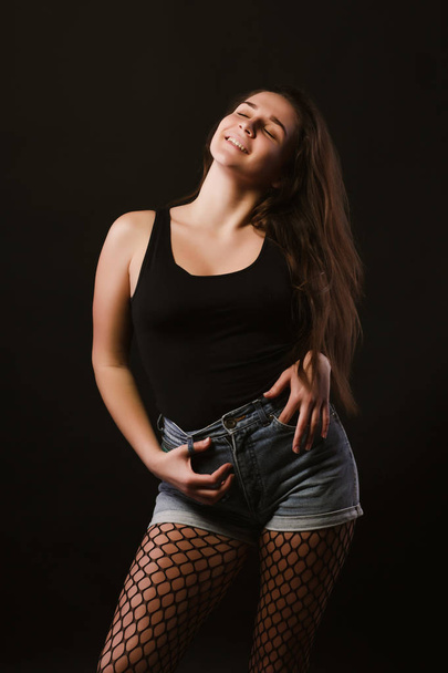 Model test with awesome smiling model in black shirt and jeans s - Фото, зображення