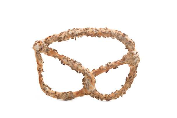 Pretzel with seeds isolated on the white - Photo, Image