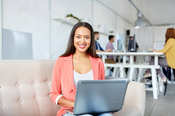 happy woman with laptop working at office - Zdjęcie, obraz
