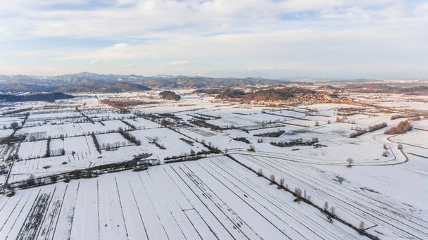 Aerial view of snow covered countryside. - Photo, Image