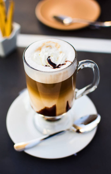 Delicious cup of coffee in the bar - Фото, изображение