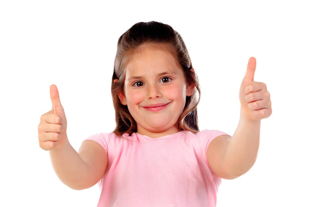happy little girl showing thumbs up isolated on white background - Foto, Imagem