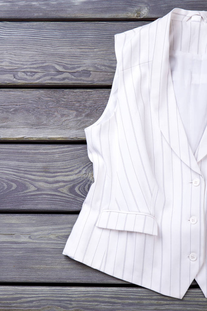 Close up white sleeveless business jacket. - Photo, Image