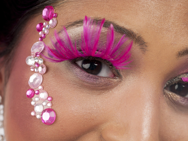 close up of womans face with makeup and jewelry - Photo, Image