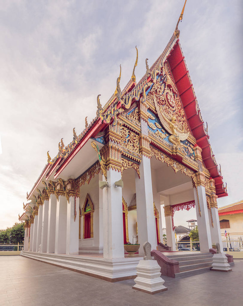 Thai temple in Phuket Town Wat Mongkolnimit. - Фото, изображение