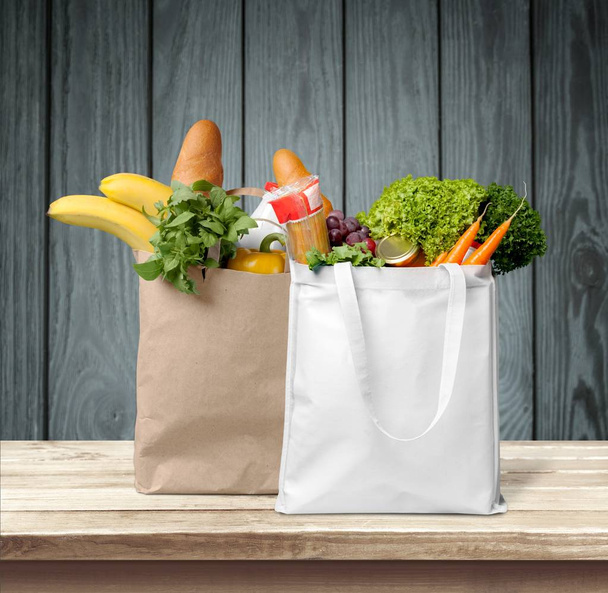 Shopping bags with grocery products variety  - Valokuva, kuva