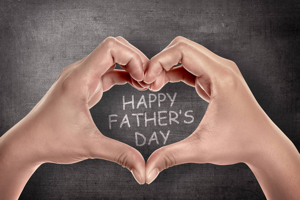 Hands with heart shape with lettering Happy fathers day - Photo, Image