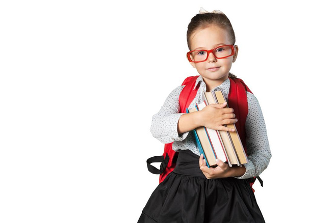 little schoolgirl with books - Foto, Imagen