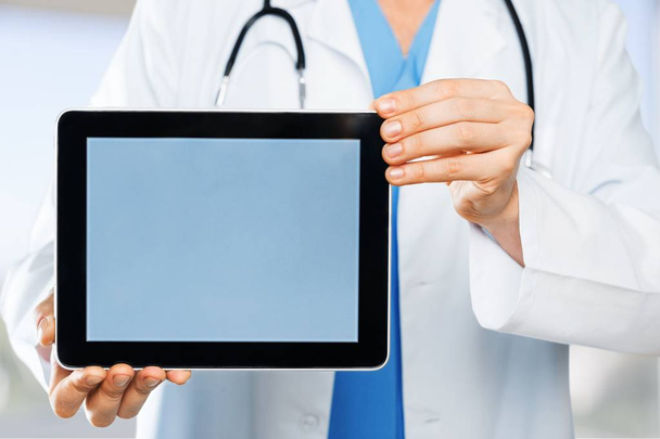 Doctor holding digital tablet, close-up view  - Photo, Image