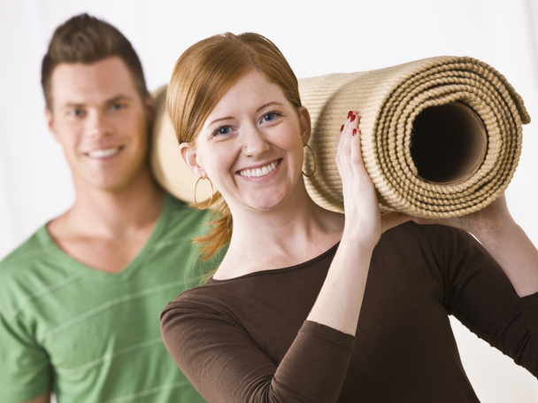 Couple Carrying Carpet Roll - Photo, Image