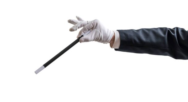 Magician hand is holding magic wand. Isolated on white backgroun - Photo, Image