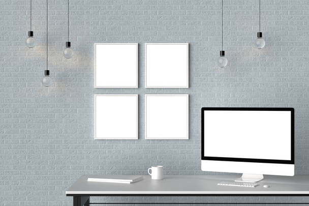 Espacio de trabajo moderno con marcos vacíos aislados en la pared de ladrillo y es
 - Foto, imagen