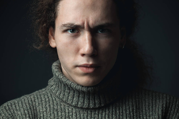 Portrait of young man stern looking - Fotografie, Obrázek