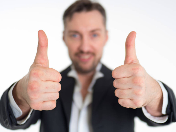 Happy smiling businessman with thumbs up gesture, isolated on white background - Fotó, kép