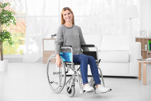 Young woman in wheelchair  - Φωτογραφία, εικόνα
