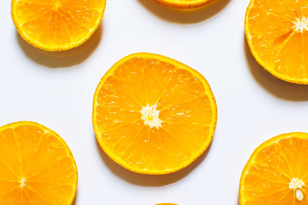 Slices of orange isolated on white background. top view; - 写真・画像