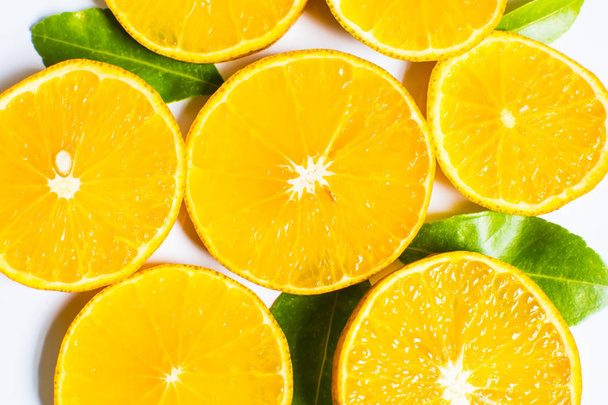 Slices of orange isolated on white background. top view; - Φωτογραφία, εικόνα