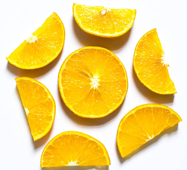 Slices of orange isolated on white background. top view; - Photo, Image