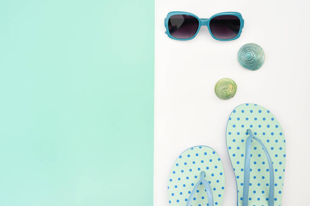 Modern fashionable sunglasses and sandals with starfish for background - Fotografie, Obrázek