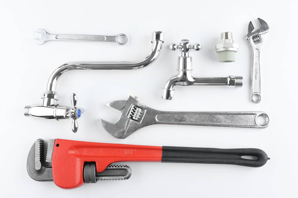 Plumbers items on white - Photo, Image