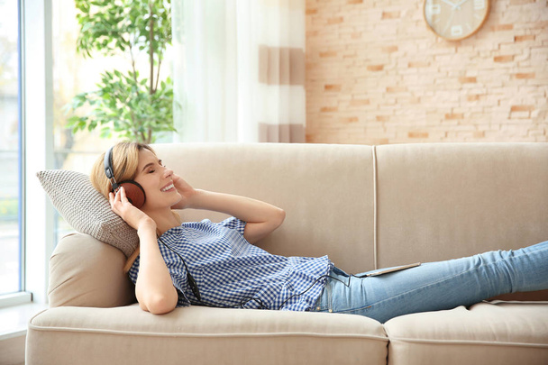 Young woman listening to music  - Photo, image