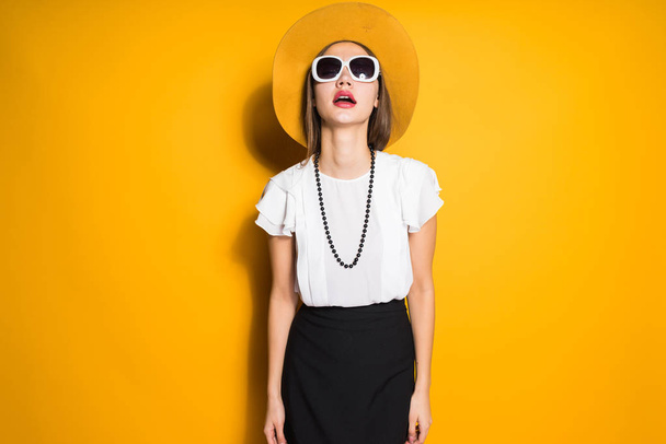 girl  in sunglasses and big dress posing  - Valokuva, kuva