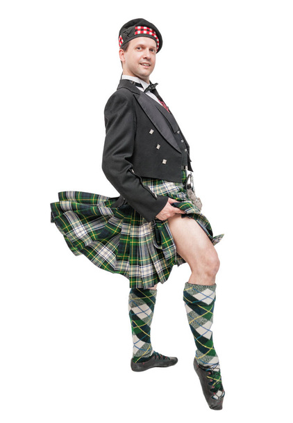 Hombre escocés en traje nacional tradicional con soplado escocés
  - Foto, imagen