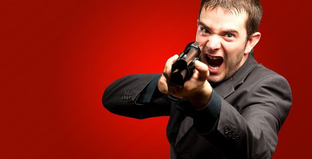 Angry Man Holding Gun - Photo, Image