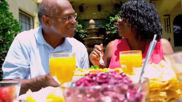 Mature Ethnic Couple Sharing Healthy Lunch Together - Footage, Video