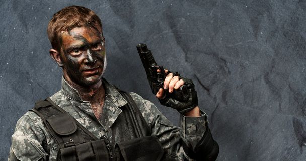 Portrait Of Soldier Holding Gun - Valokuva, kuva