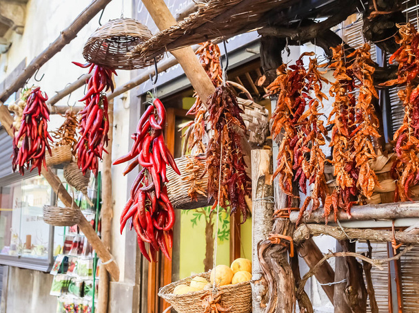 Bundles of red pepper in the Italian market. Sorrento, Italy - Zdjęcie, obraz