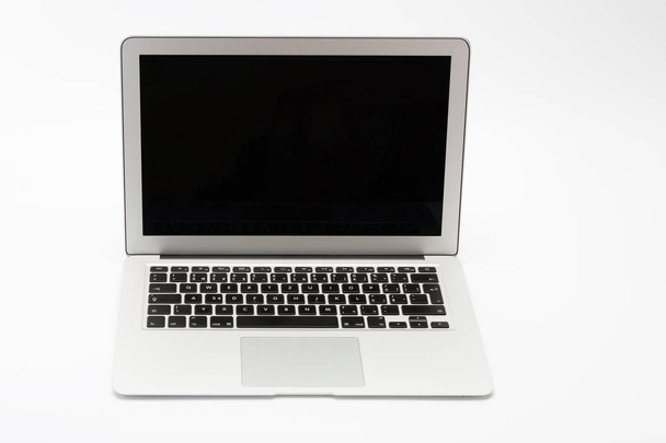 Open modern new laptop on white background - Фото, изображение
