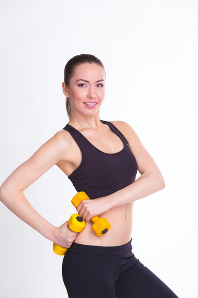 woman with dumbbells - 写真・画像