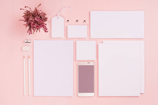 Corporate identity template, white blank stationery set with dry flowers and phone on pastel pink stylish background. Mock up for branding, business presentations and portfolios. - 写真・画像