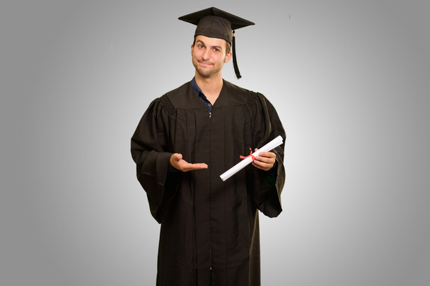 Portrait Of Young Graduation Man Holding Certificate - Photo, Image