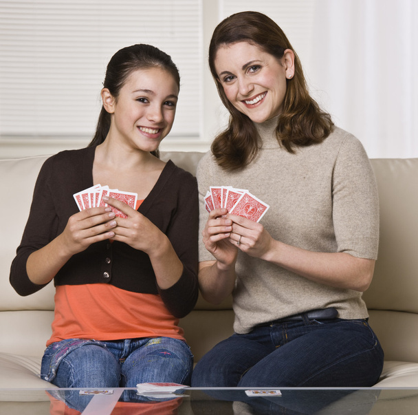 Mother and Daughter Playing Cards - Fotó, kép