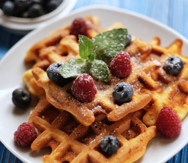 Traditional belgian waffles with fresh berrys and sugar powder   - Zdjęcie, obraz