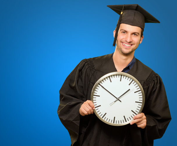 Graduate Man Relógio Segurando
 - Foto, Imagem