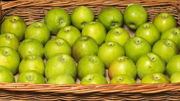 Bunch of green apples in supermarket - Photo, Image