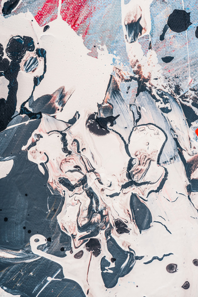 Spritzer grauer Ölfarbe auf abstraktem Hintergrund  - Foto, Bild