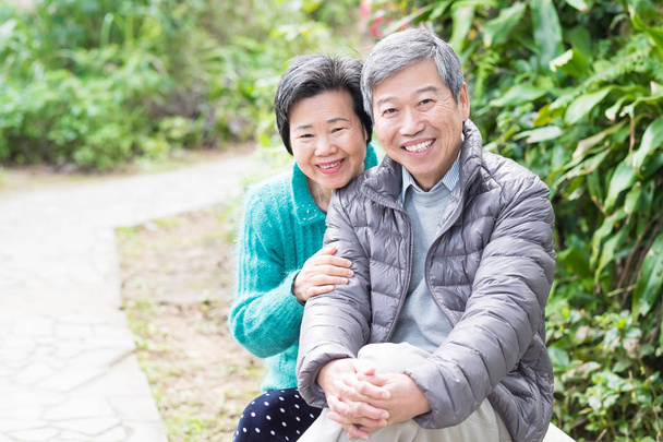 old couple posing  happily in the park - Photo, image