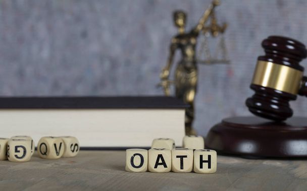Word OATH composed of wooden letters. - Photo, Image