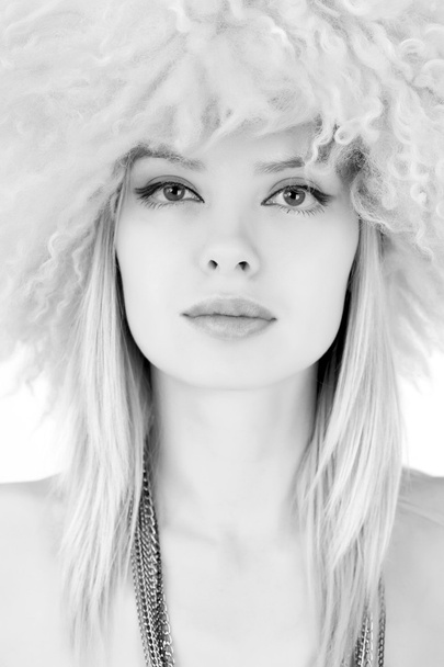 Portrait of a girl in furry hat - Photo, Image