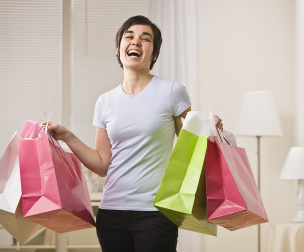 Smiling woman with shopping bags. - Photo, Image