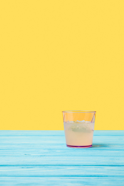 fresh cold summer cocktail on turquoise wooden table top - 写真・画像