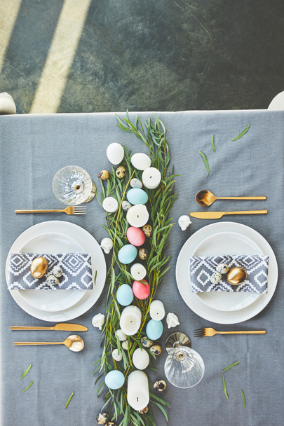 top view of easter eggs on festive table in restaurant - Foto, Bild