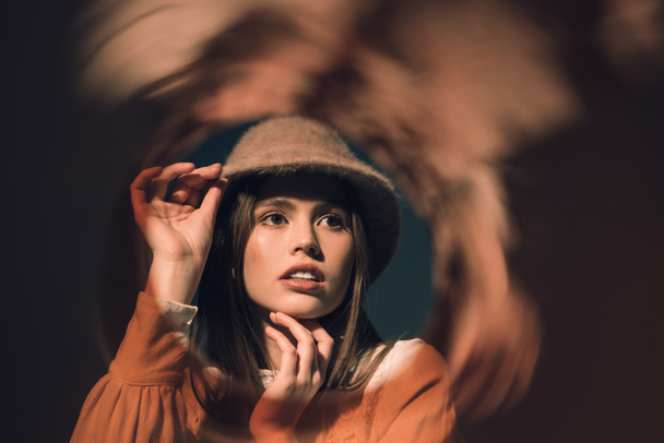 portrait of pensive woman in stylish hat looking away - Фото, изображение